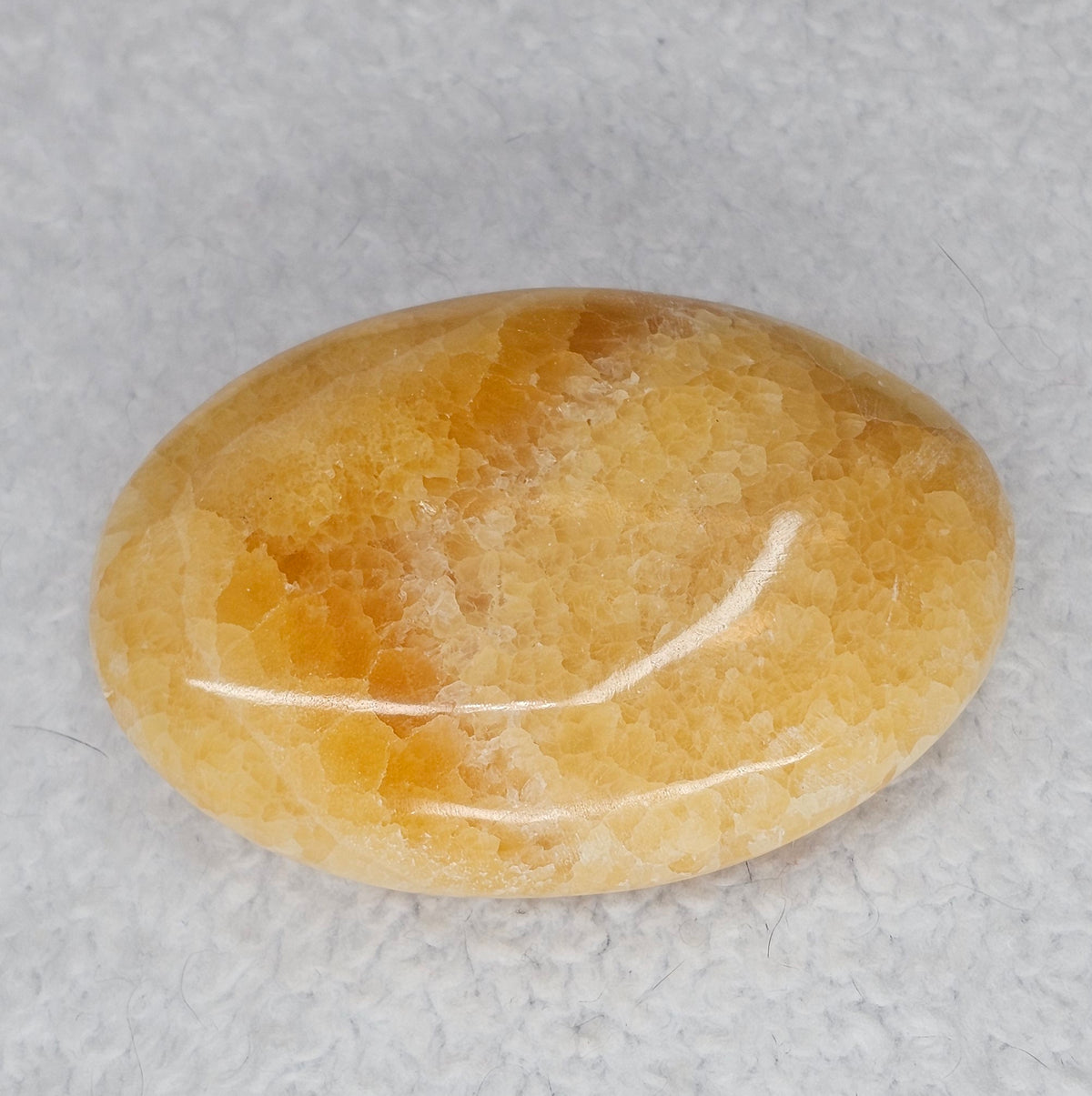 Mango Calcite Palm Stones B227