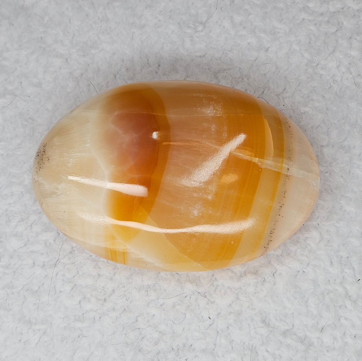Orange Banded Calcite Palm Stones