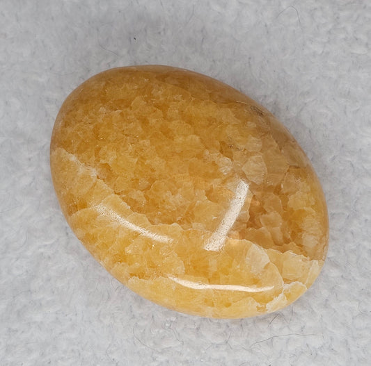 Mango Calcite Palm Stones