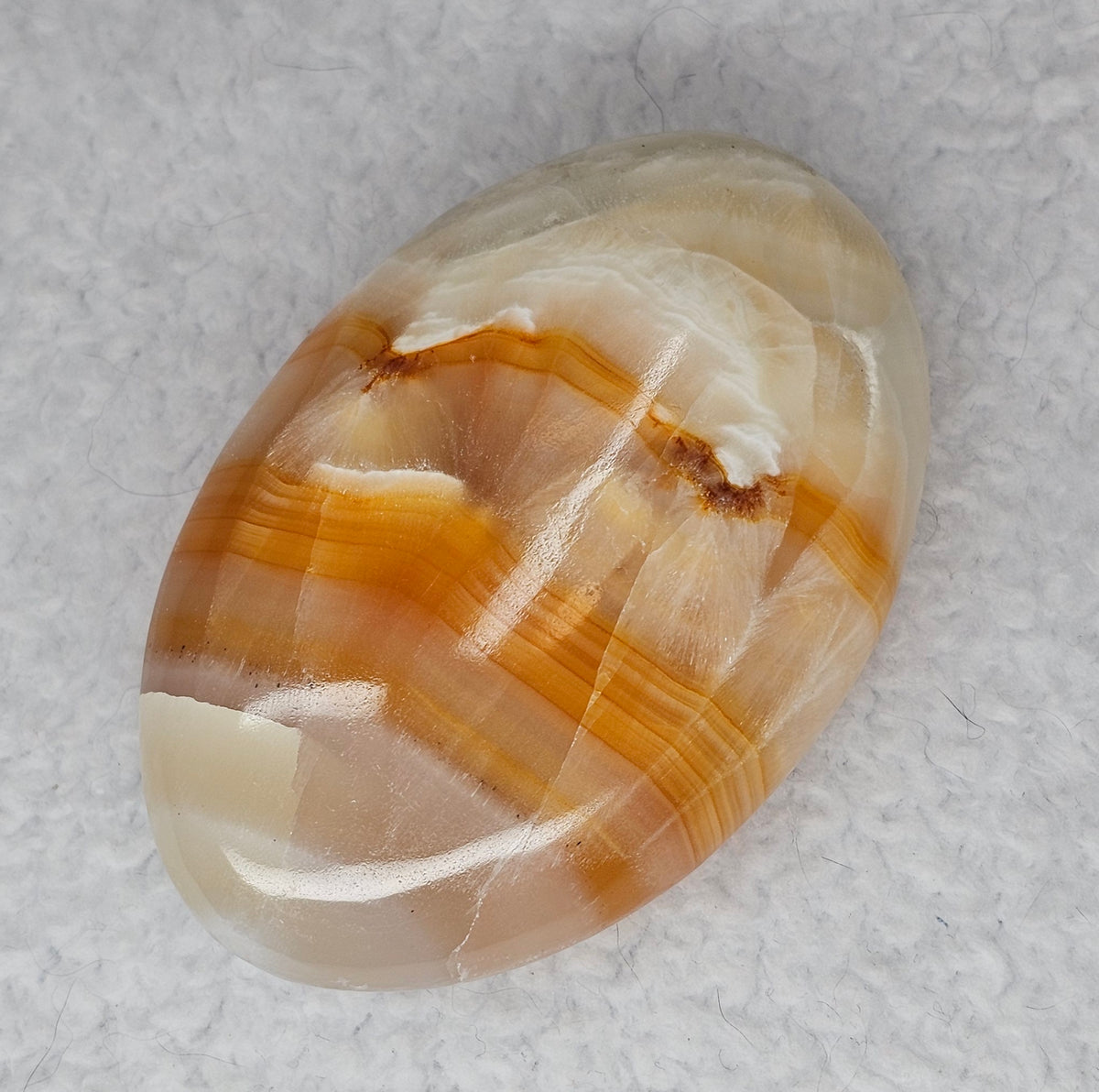 Orange Banded Calcite Palm Stones