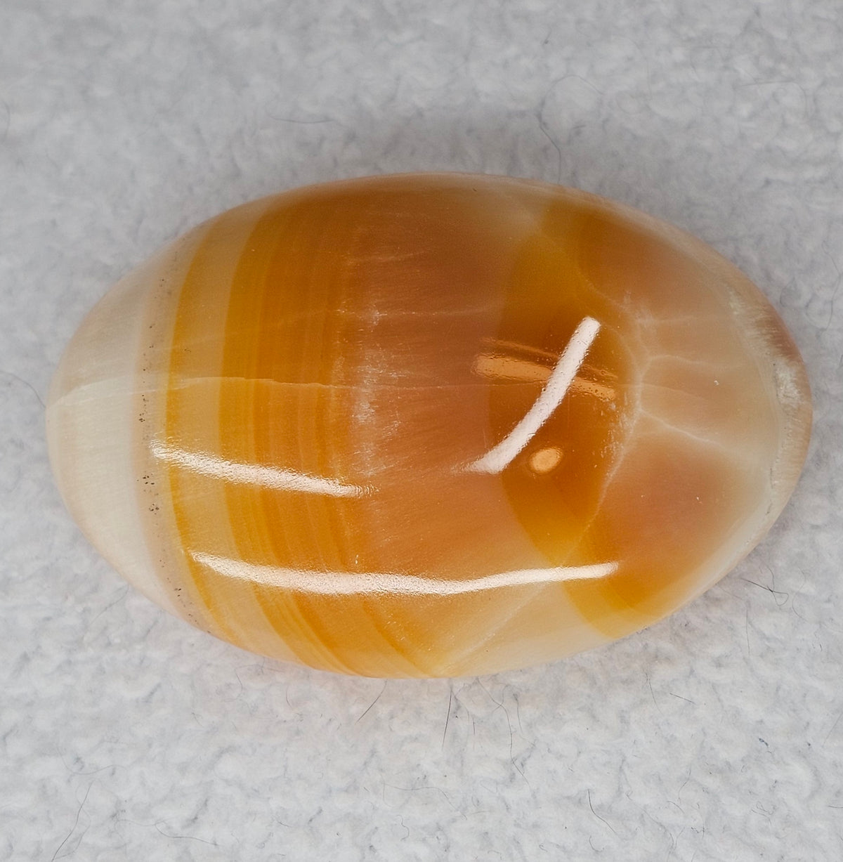 Orange Banded Calcite Palm Stones